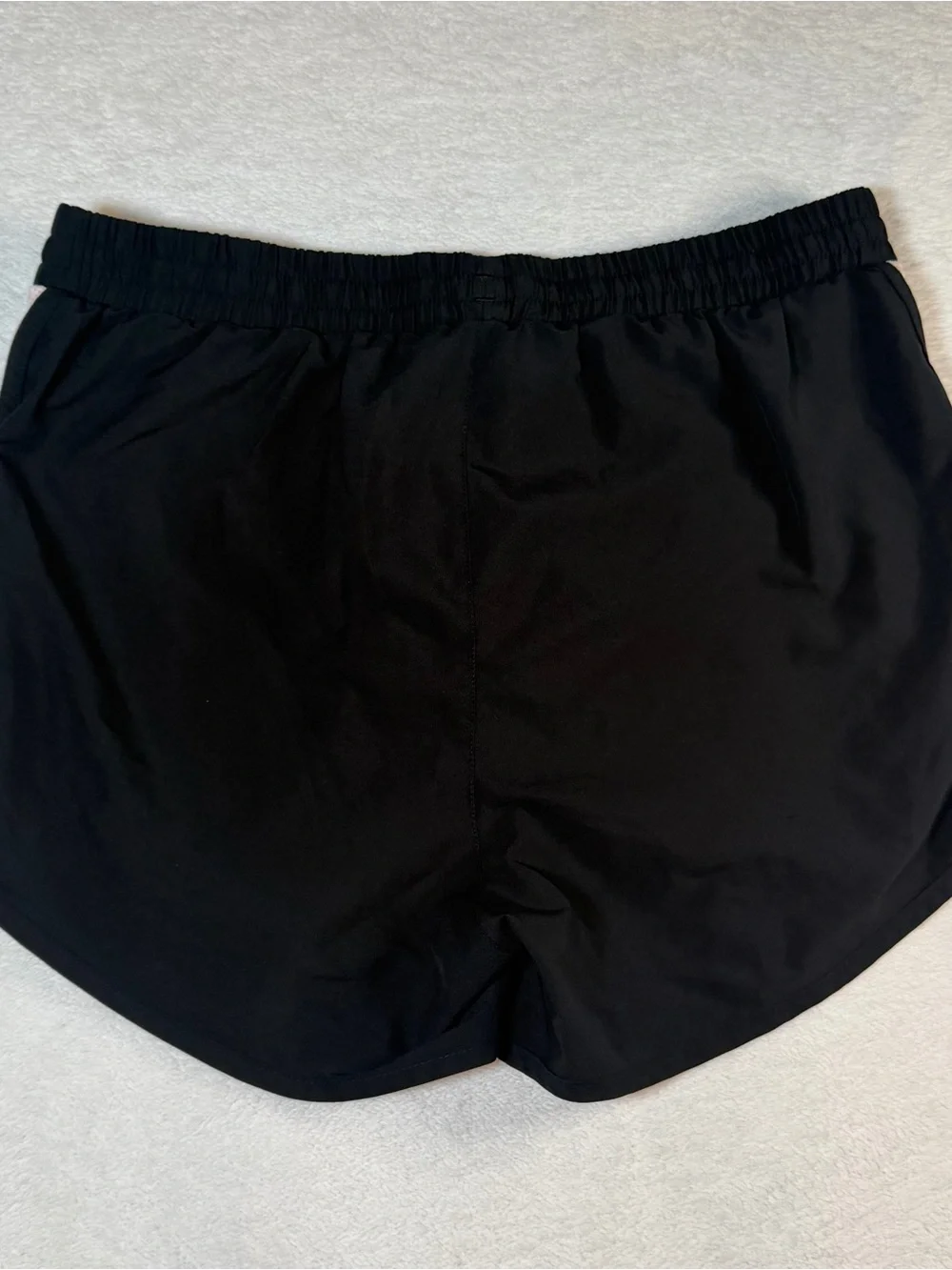 Under Armour Black Athletic Shorts with Light Pink Accents women’s